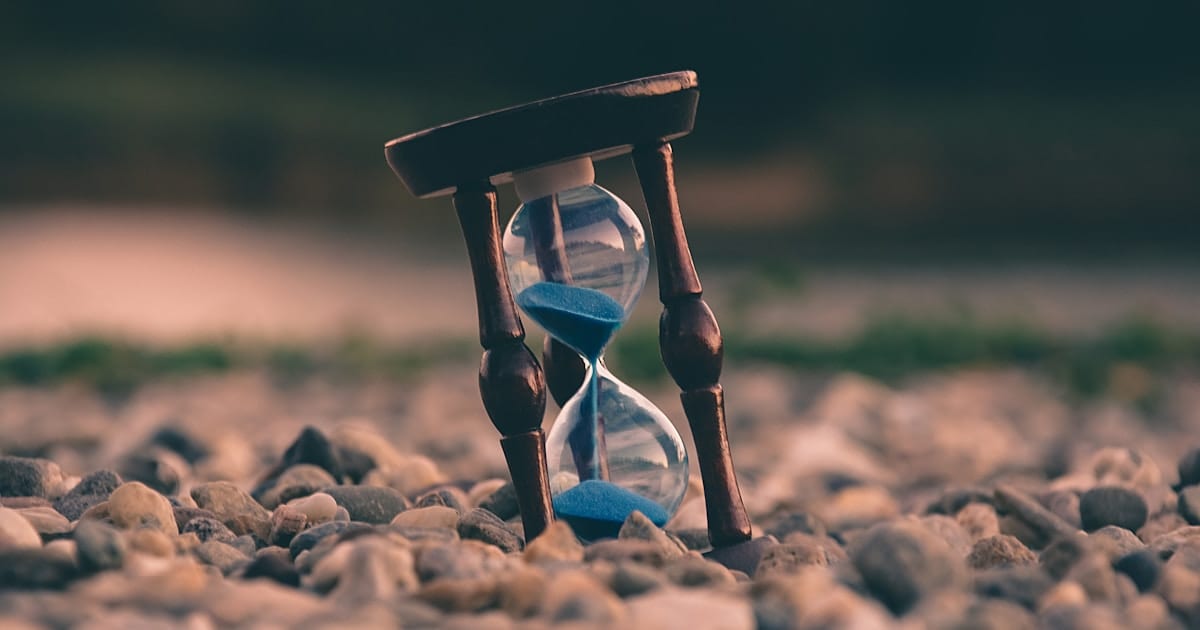 Hourglass with sand running through